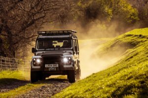 Land Rover Defender showcasing its versatility as the ideal daily driver in both urban and off-road settings.