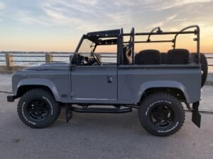 Land Rover Defender showcasing its versatility as the ideal daily driver in both urban and off-road settings.