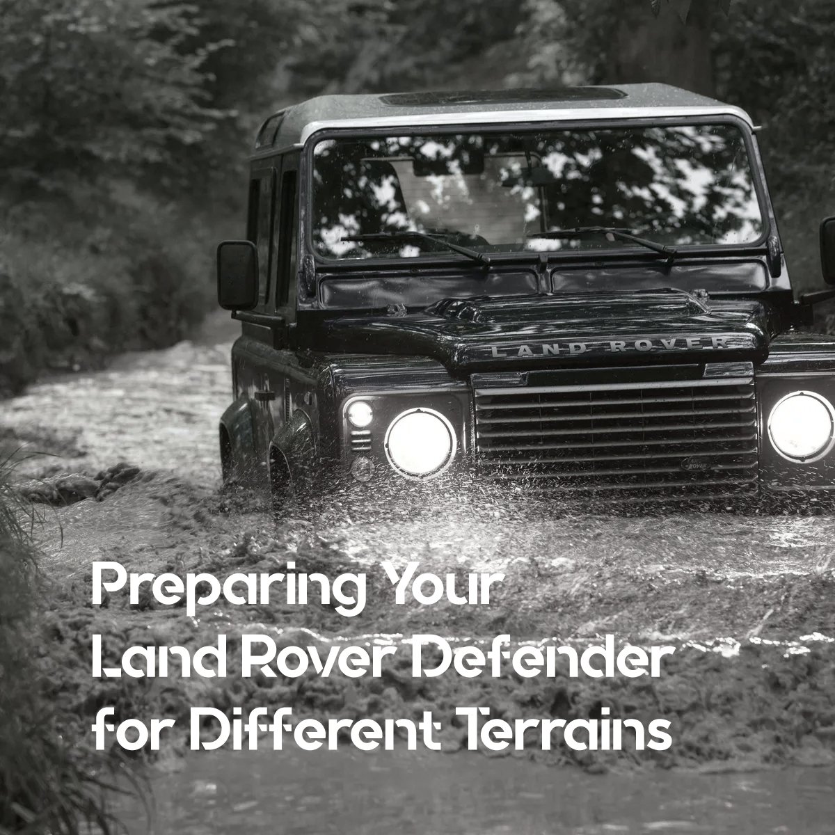 A rugged Land Rover Defender in a dynamic off-road setting, driving through a mix of terrains such as rocky hills, sandy dunes, and muddy trails. The vehicle should have key visible modifications like all-terrain tires, a roof rack with extra gear, and underbody protection. In the background, a mountainous or desert landscape contrasts with the Defender's tough, adventure-ready stance. The image can convey the versatility and preparation required for tackling different terrains with confidence.